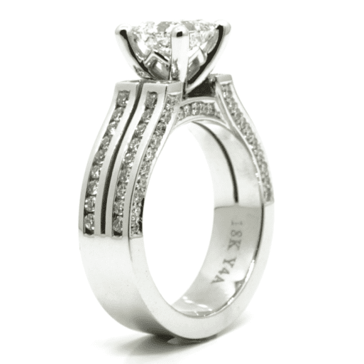 18 Karat White Gold Channel Set Princess Cut Diamond Ring